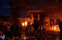متظاهرون عراقيون يشعلون النيران في بوابة القصور الرئاسية بالبصرة